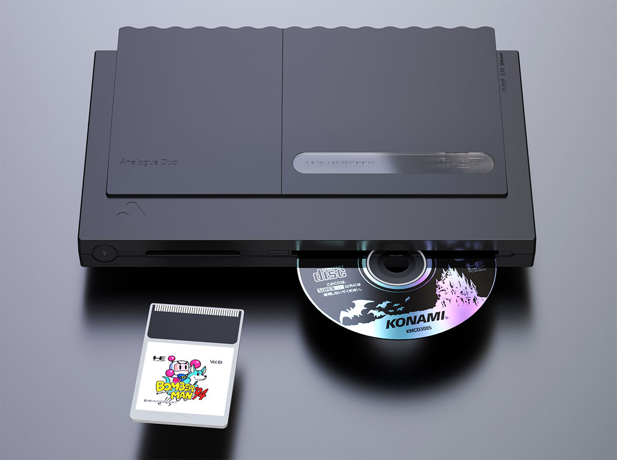 A Analogue Duo console with a CD sticking part way out the CD slot and a HuCard of Bomberman '94 sitting in front of the HuCard slot